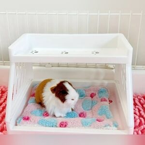 White Small Pet House with Pink and Blue Mat. In Good Condition